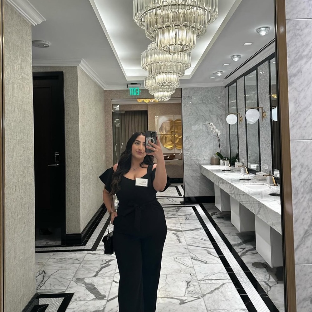 Calvin Klein Black Sleeveless Jumpsuit with Fitted Silhouette